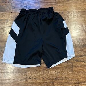 Reversible athletic shorts youth size large, which is probably 10 to 14. Allison